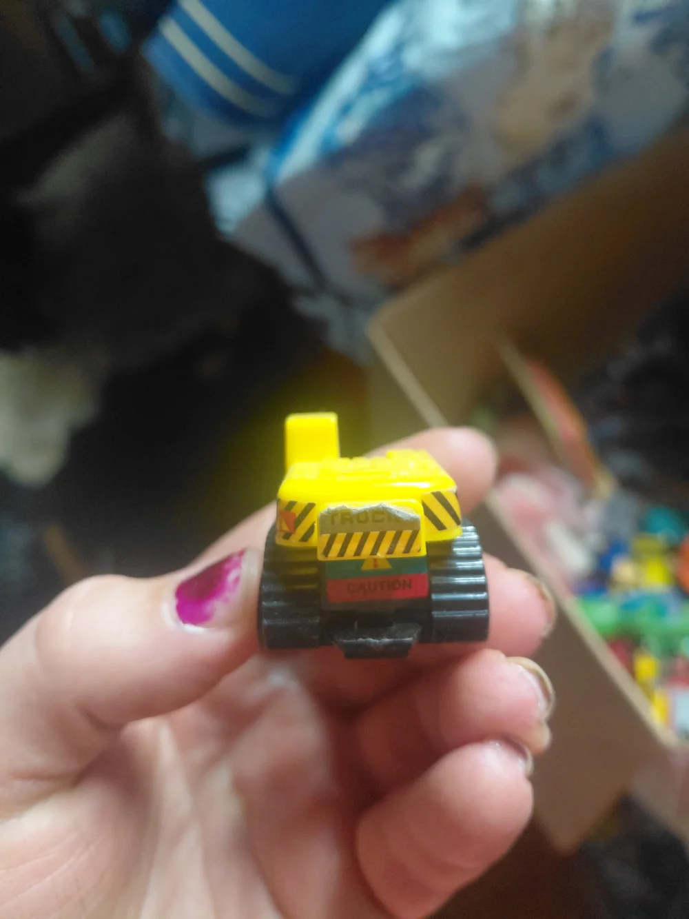 yellow plastic Kid Galaxy bulldozer toy features 